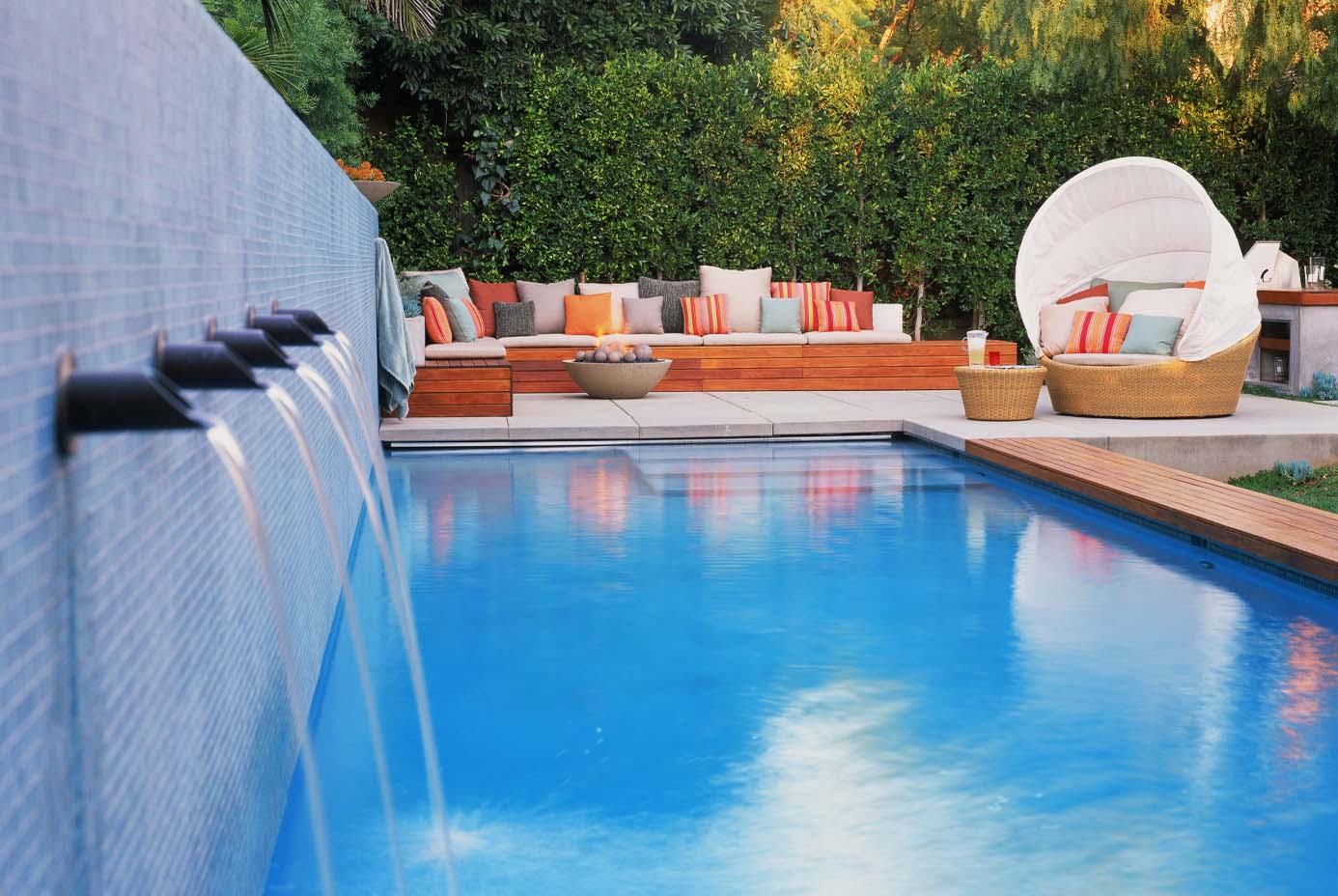 Pool: A modern twist on a classic pool feature, bronze spouts provide fountain-like sound of cascading water.