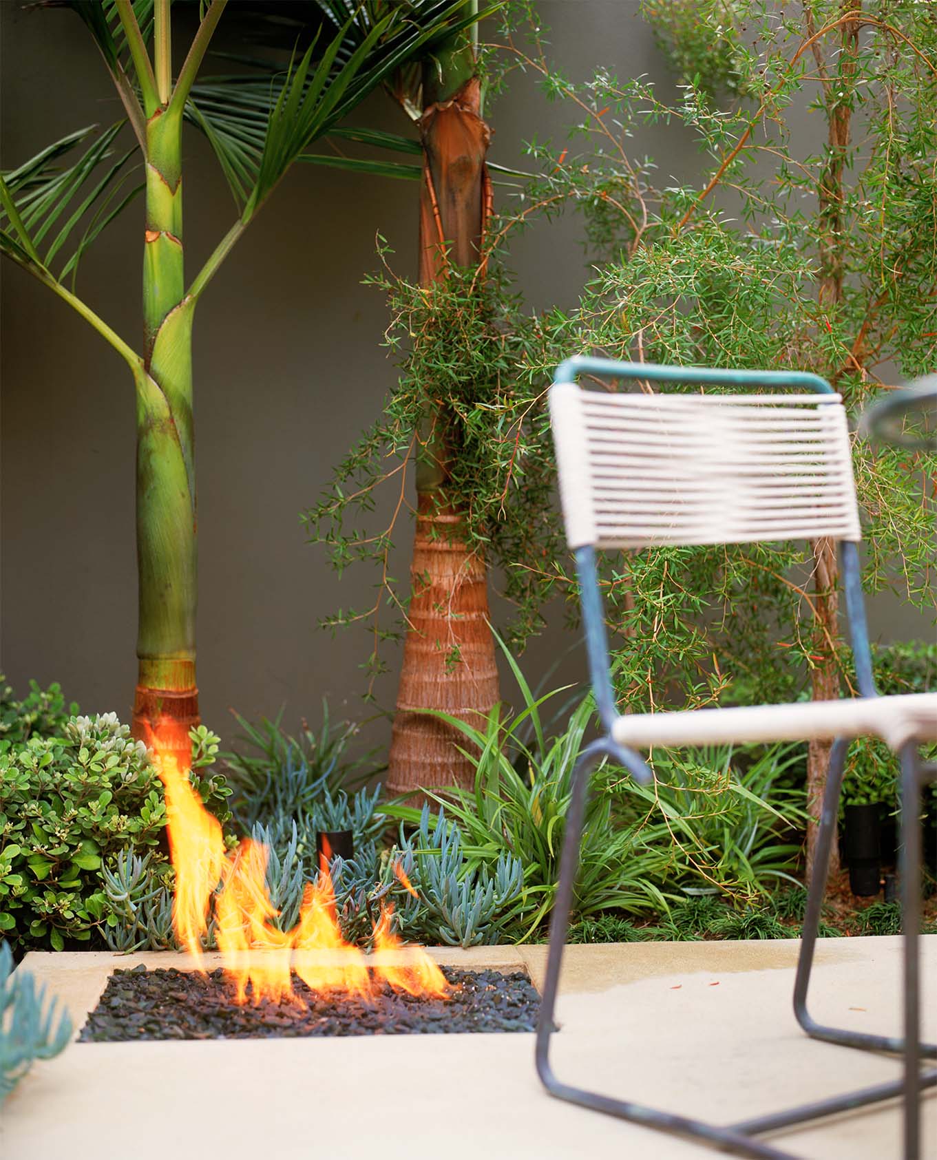 Patio Firepit: A recessed gas fire pit provides warmth on cool evenings, and may be covered when not in use.