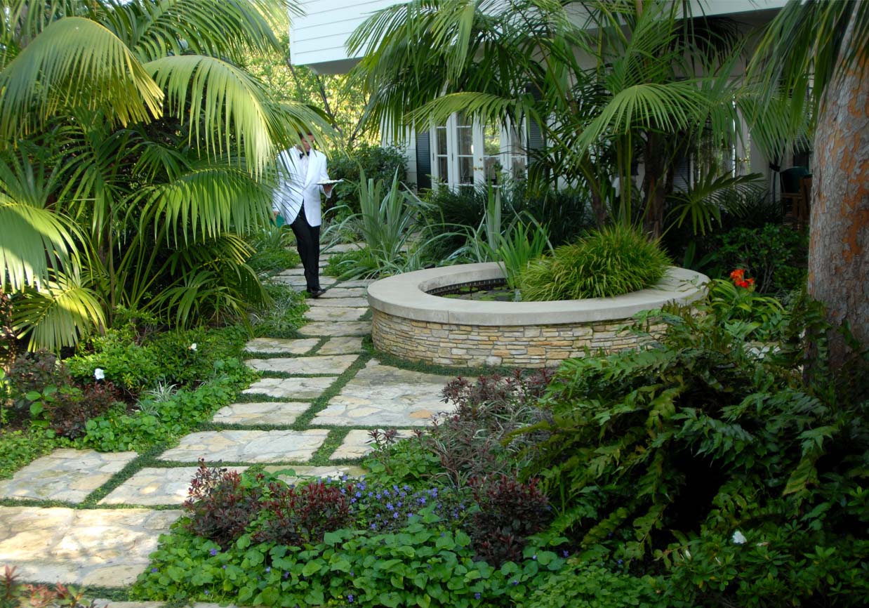 Courtyard: An interior courtyard provides a focal point from all areas of the home. A raised stone fountain produces the serene sound of flowing water.